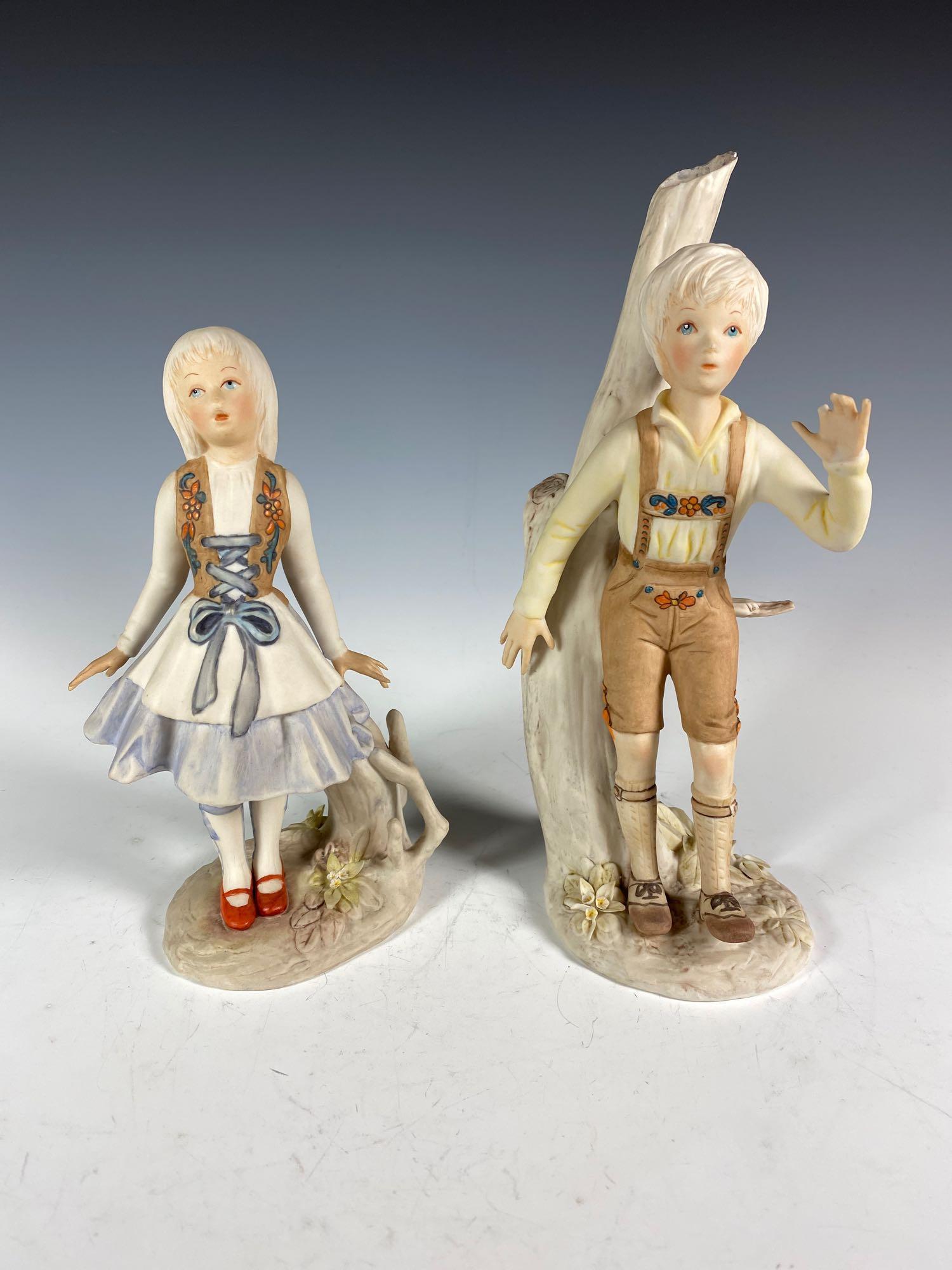 Vintage Cybis Children Figurines: Cybis signed children figurines boy approx. 9 1/4" tall, girl 7 1/4" tall. In good age appropriate condition see photos.