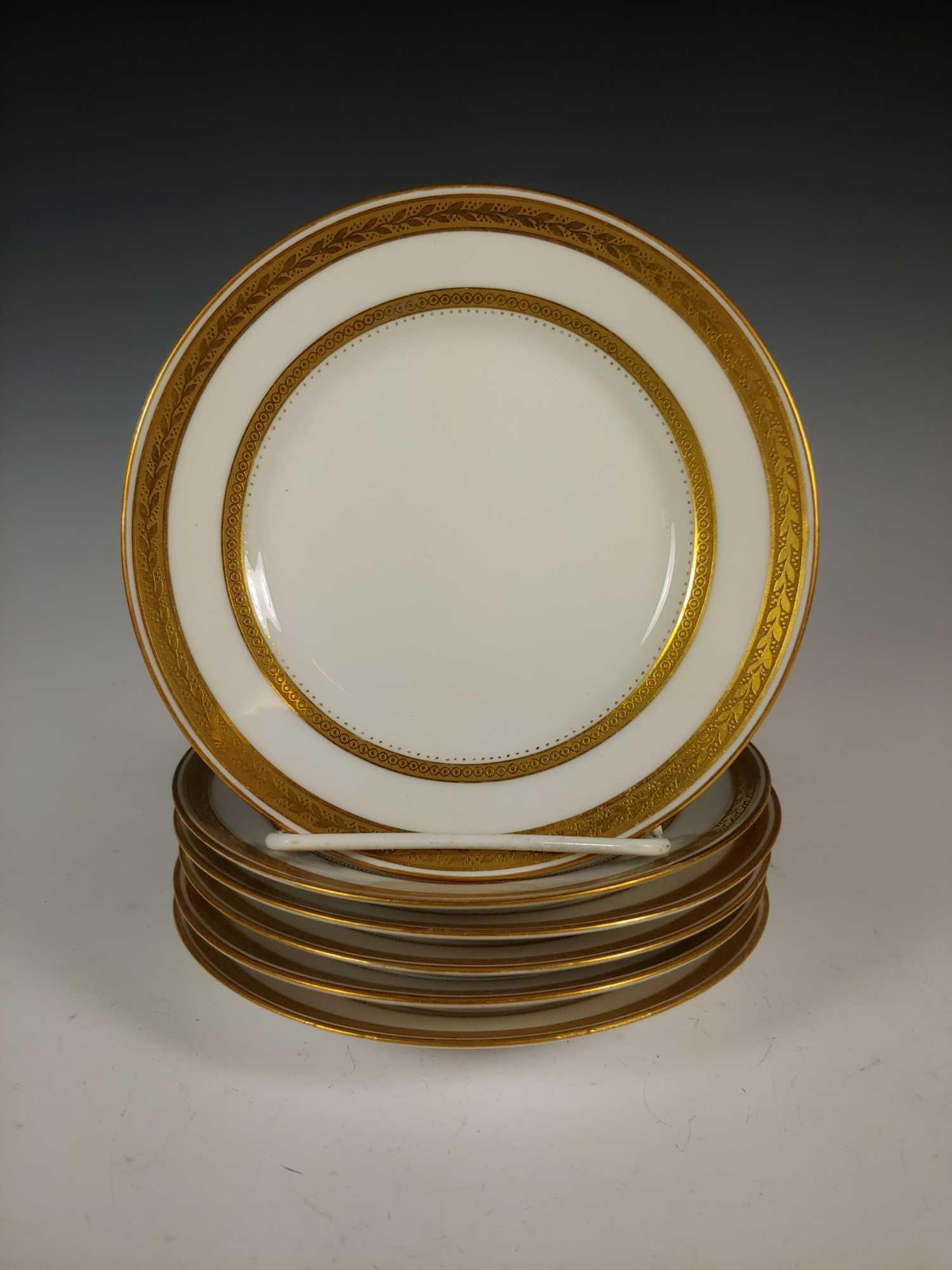 Set of 6 L. Bernardaud Limoges D & C France Plates: L. Bernardaud Limoges D & C France bread plates. Approx. 6 1/4" diameter having gold gilded vine trim. In good age appropriate condition, see photos.