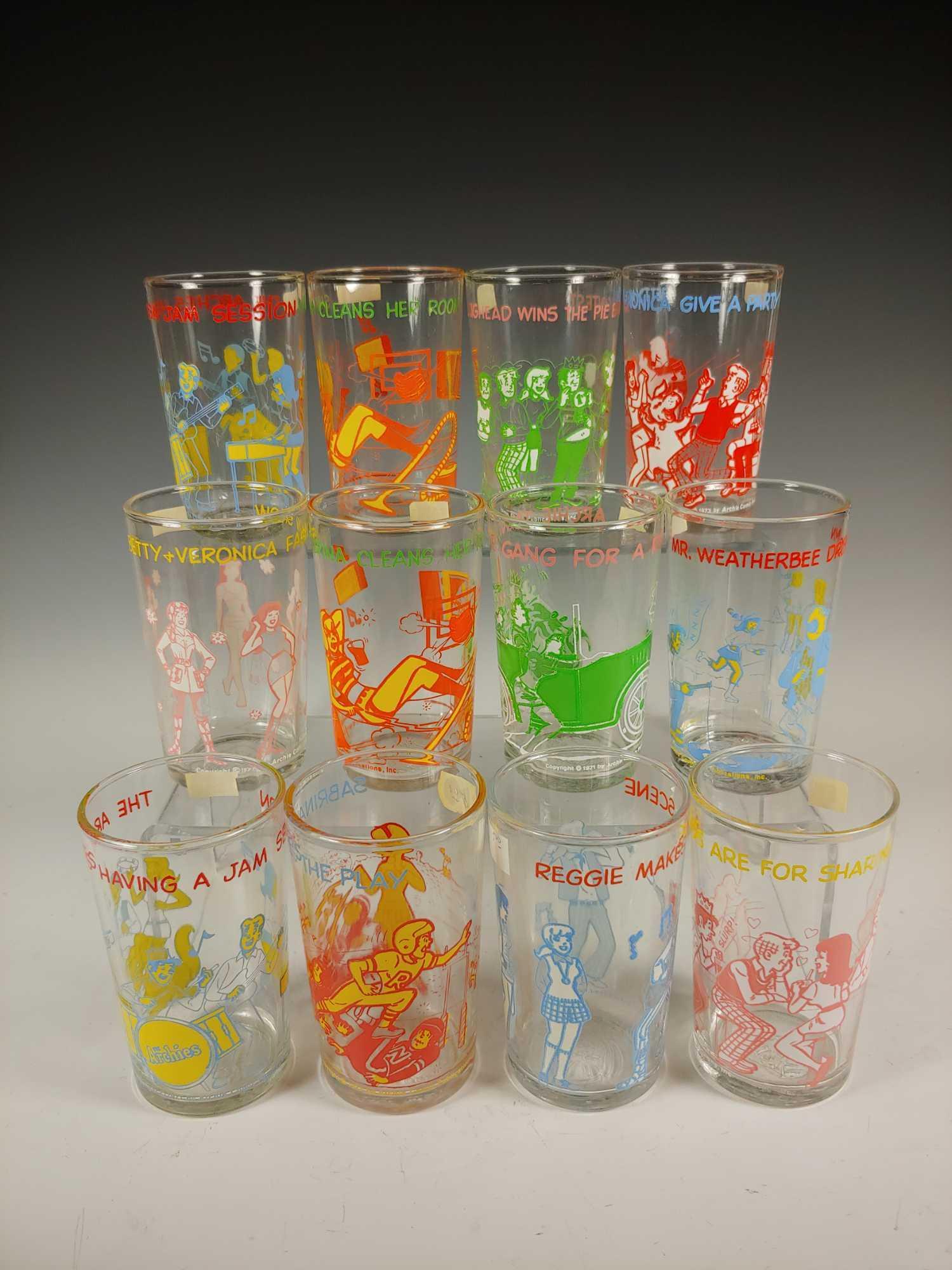 12 Vintage 1970's Archie Comic Collectable Jelly Jar: Collection of 12 collectable jelly jar glasses by Archie Comic Publications Inc. Approx. 4 1/4" tall with different scenes and quotes. In good age appropriate condition, see photos.