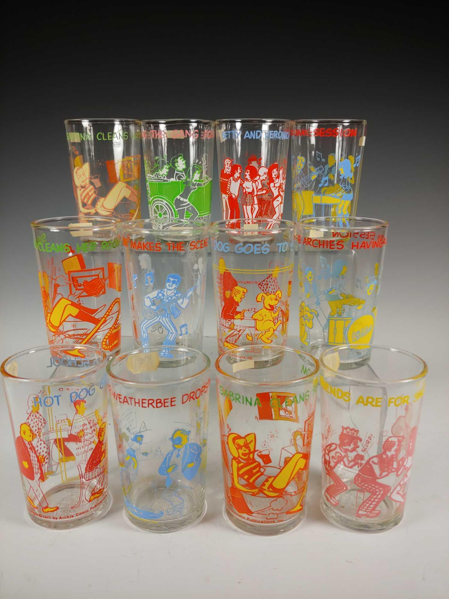 12 Vintage 1970's Archie Comic Collectable Jelly Jar: Collection of 12 collectable jelly jar glasses by Archie Comic Publications Inc. Approx. 4 1/4" tall with different scenes and quotes. In good age appropriate condition, see photos.