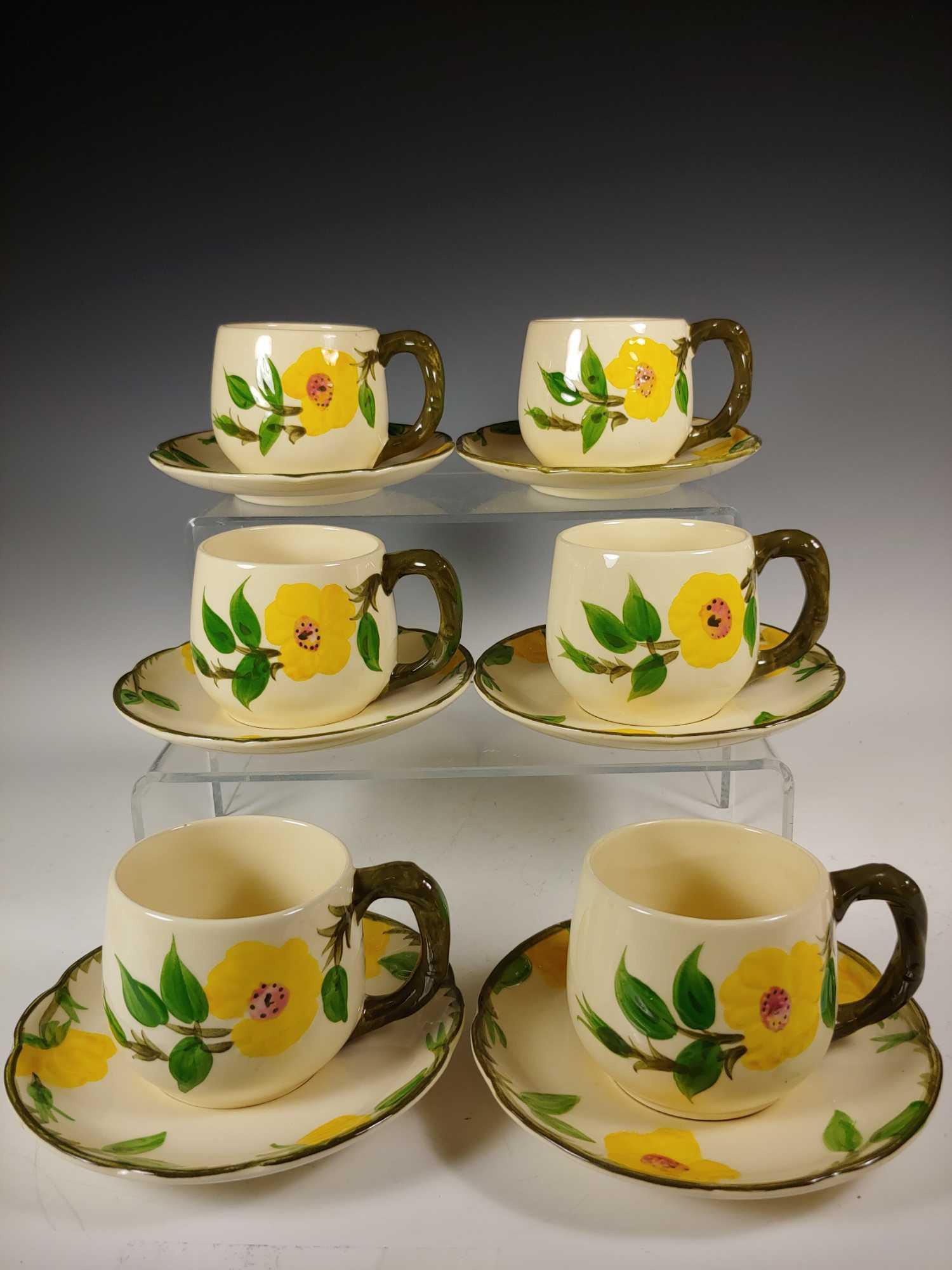 Franciscan Earthenware Meadow Rose Cups and Saucers: Set of 6 Franciscan Earthenware Meadow Rose pattern cups and saucers with bonus cup. Saucers approx. 5 3/4" diameter and cups 2 3/4" tall. All in very good condition with no breaks or cracks, see phot
