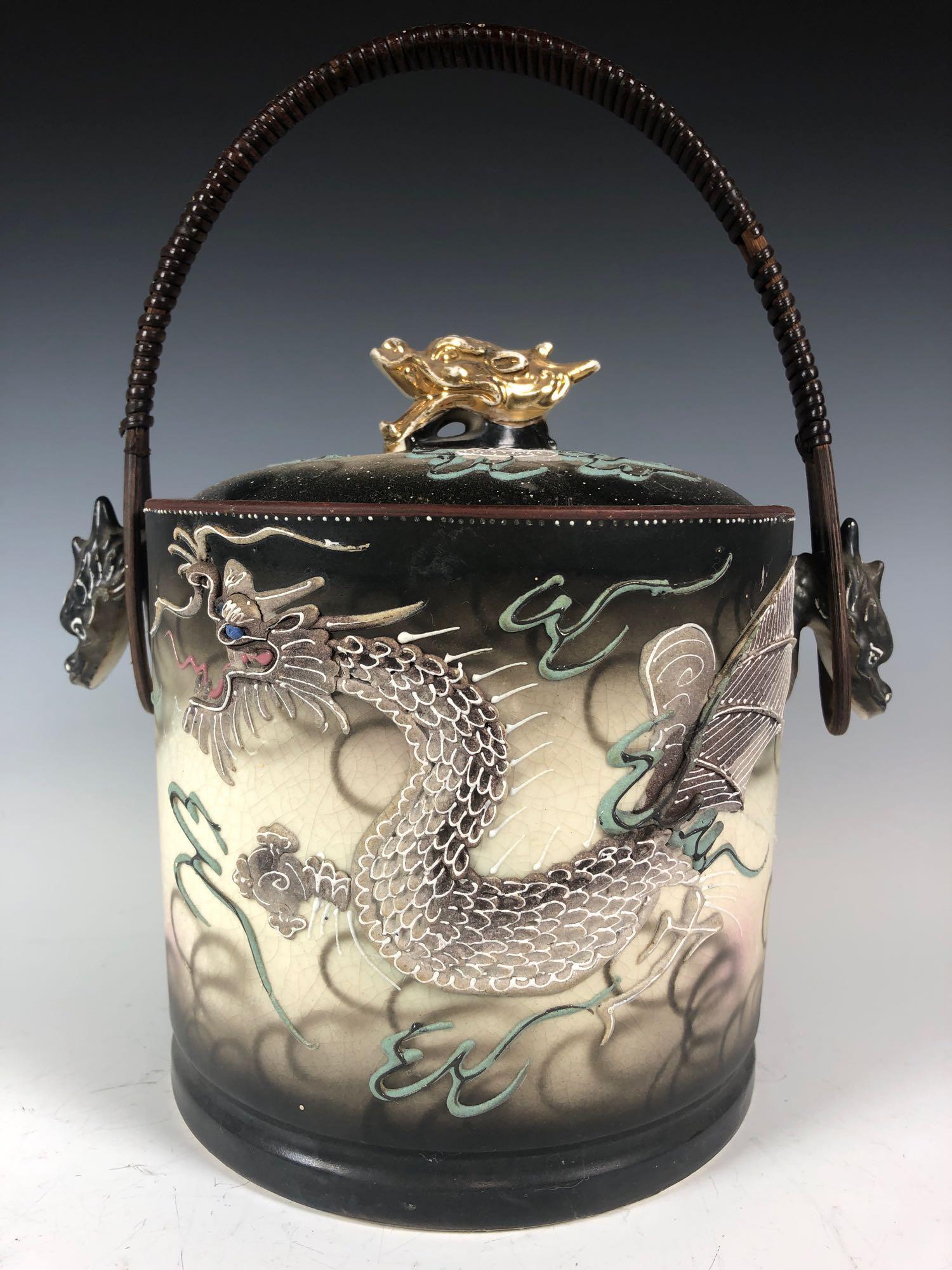 Japanese Satsuma Style Porcelains: Includes lidded ice bucket or biscuit barrel with wrapped twig wood handle and a footed incense burner. Both with light ware consistent with age, see photos.