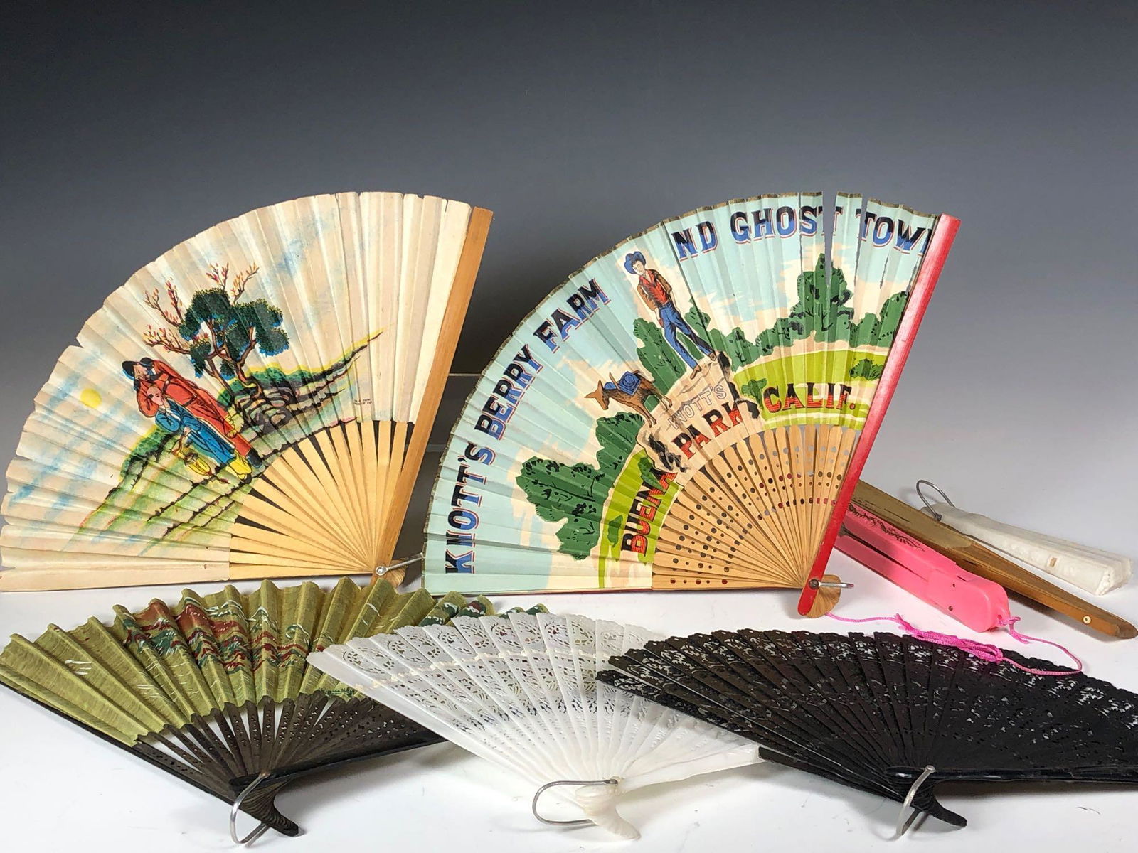 Eight Chinese and Japanese Fans: Group of eight decorative 20th century vintage Chinese & Japanese ladies hand FANS including one hand painted and signed on rice paper and others. See photos.