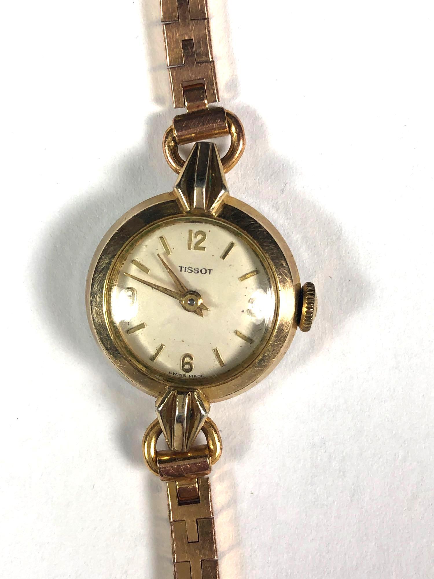 Vintage Ladies TISSOT Wrist Watch: Vintage ladies round dial TISSOT wrist watch with rose gold band and appears to have gold case although un tested. Working and in good used condition, see photos.