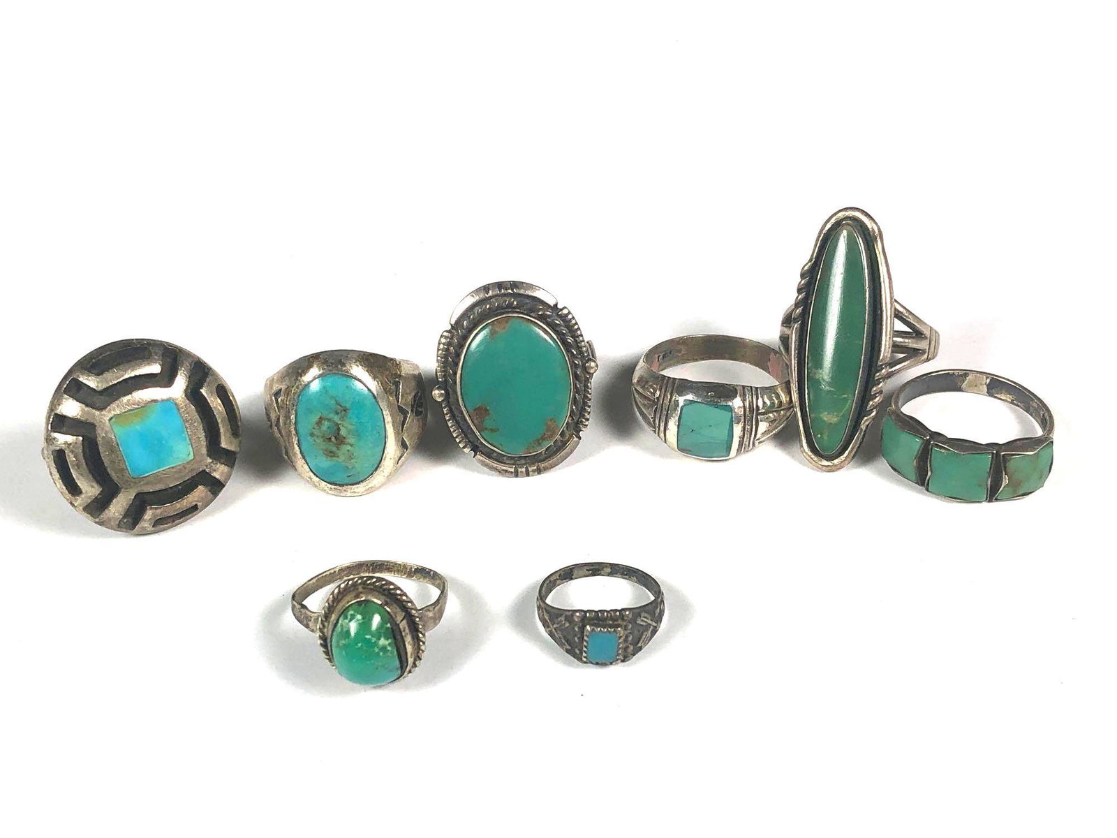 Nine Native Sterling and Mexico Rings: Includes small baby ring, childs, mens and womens. Various pattern and designs. Early 20th century. See photos for use and wear as shown.