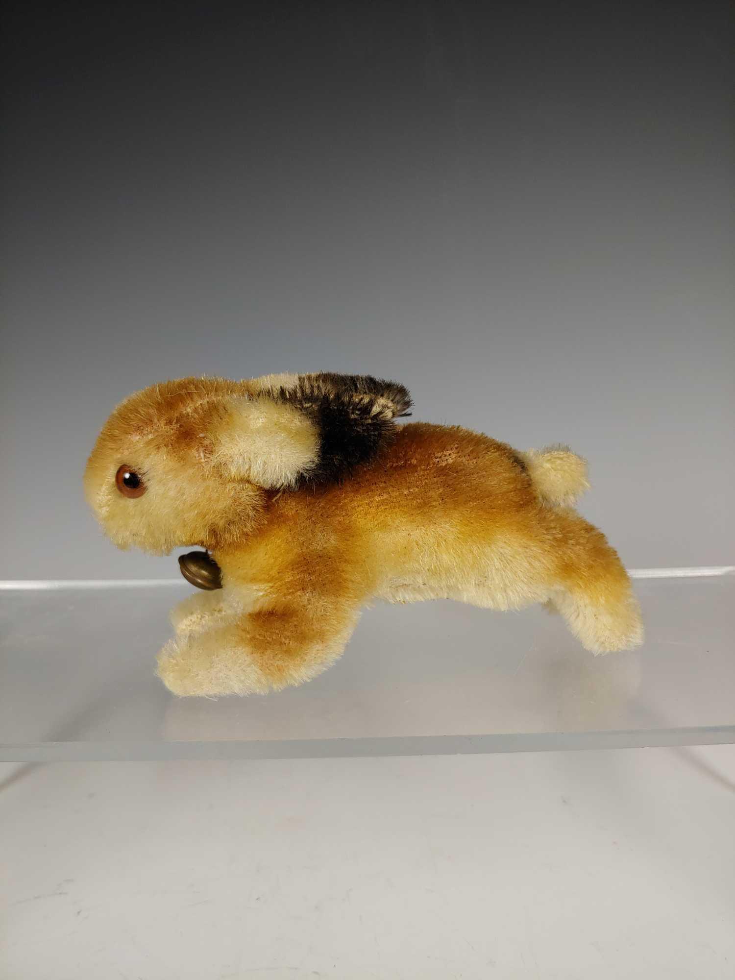 Vintage Steiff Rabbit with Original Button: Approx. 5" long with original button on ear and original bell. In good age appropriate condition, see photos.