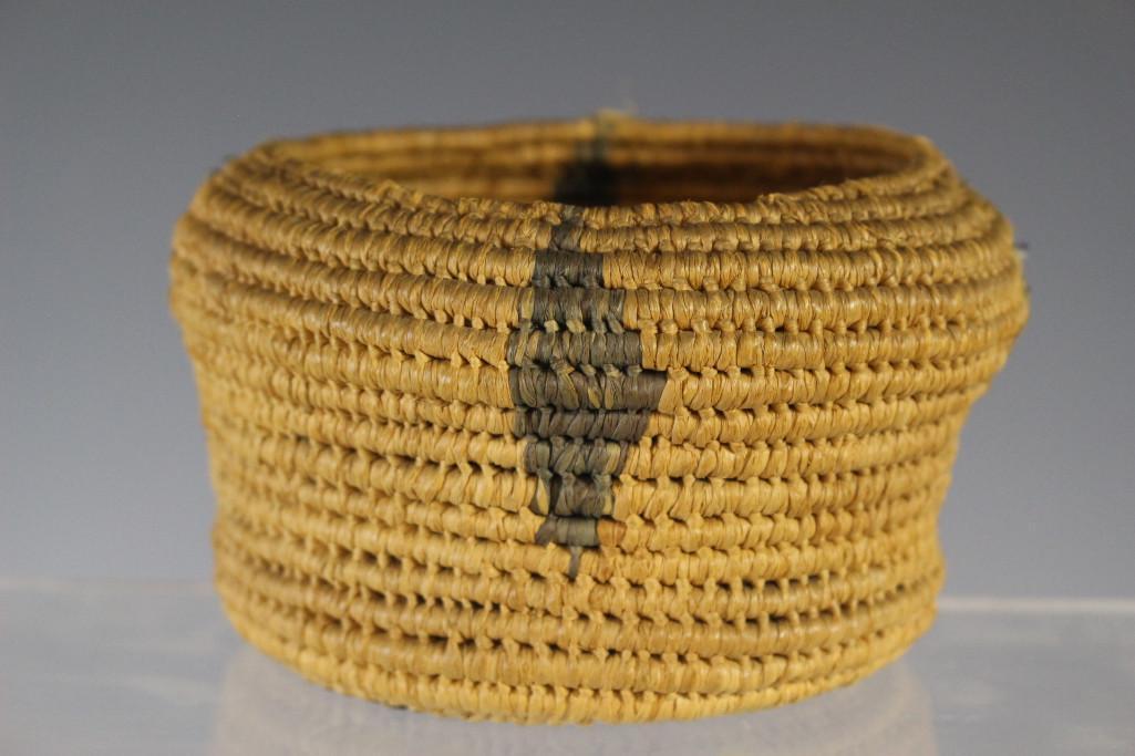 Early American Indian Woven Basket: Most likely Northern California , early 20th century. Finely woven with array of crosses alternating with vertical pennants or diamond decorations . Height 3" h x diameter 5 3/8 inches. Condition very