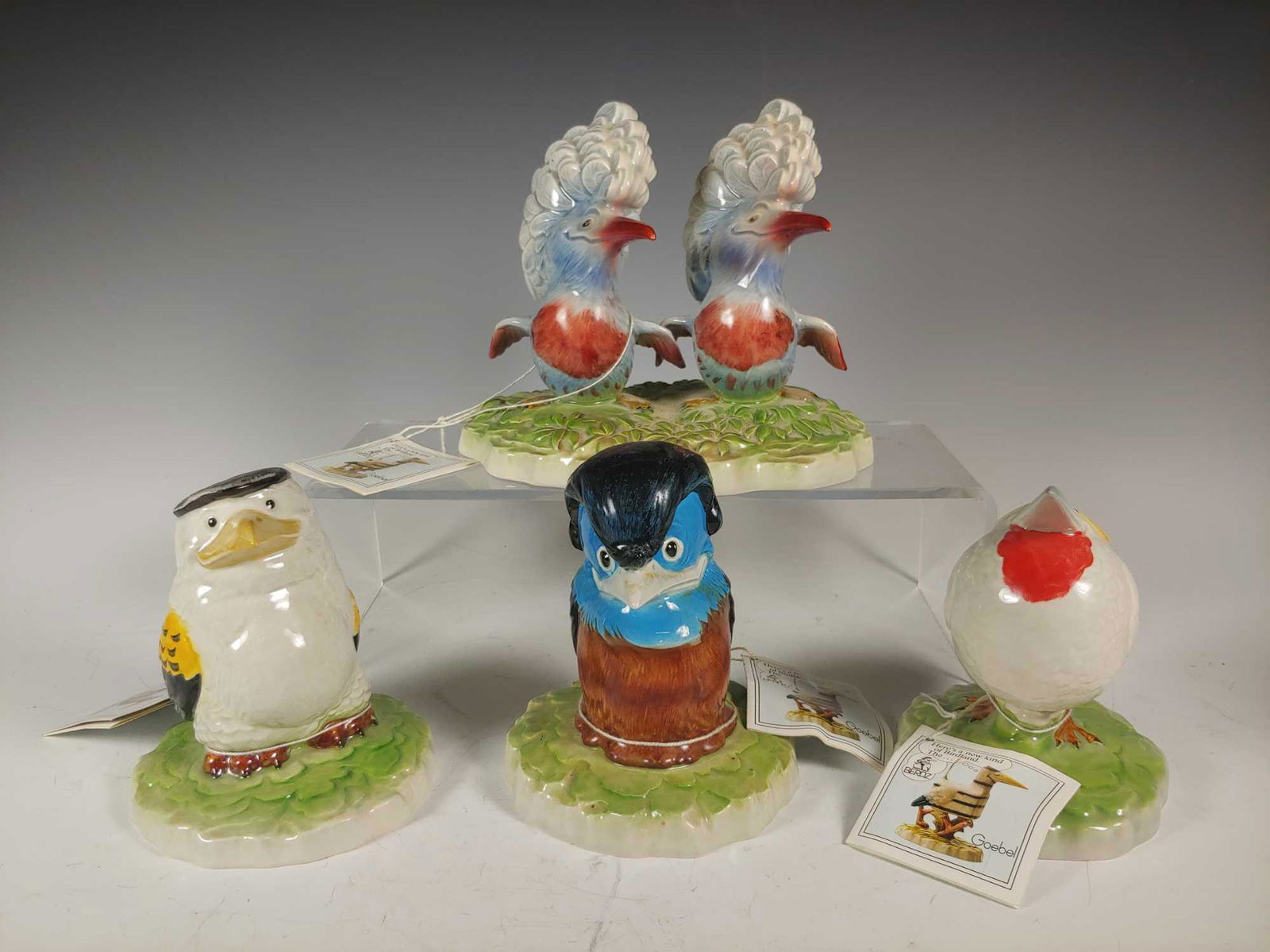 Four Goebel Porcelains birds by Gunter Scherrers: Including Max von Vogelburger, double figurine Maggie Pye and Mabel Tree, George Jderdown and Eddy Brainbird. All 1982 vintage and in very good condition as shown.