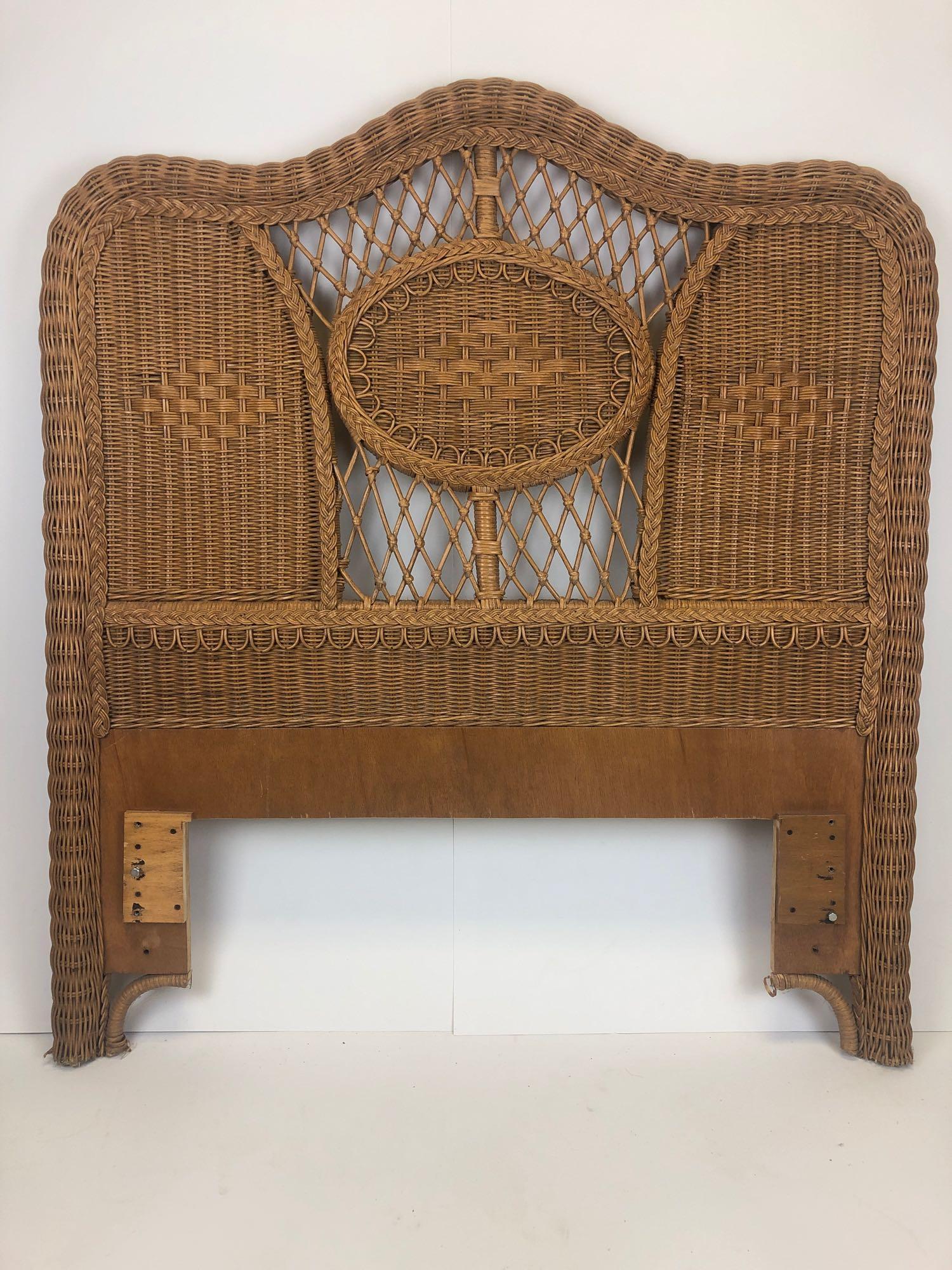 20 th C. Henry Link Lexington French Country Wicker: 20 th C. Henry Link Lexington French Country Wicker Twin Headboard. Good overall clean condition- please see the pictures. Measures approximately 51.5" Tall x 45" wide x 2.5" Deep. Rails are not inclu
