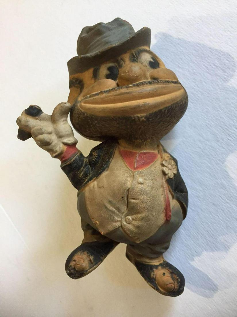 1940's Brooklyn Dodgers Rempel Bum Mascot Rubber Doll: Some refer to these mascot dolls as the "squeaky toy" because the pliable rubber characters have a squeaker in the back side.Â This one does work.Â Overall very good condition with some signs of