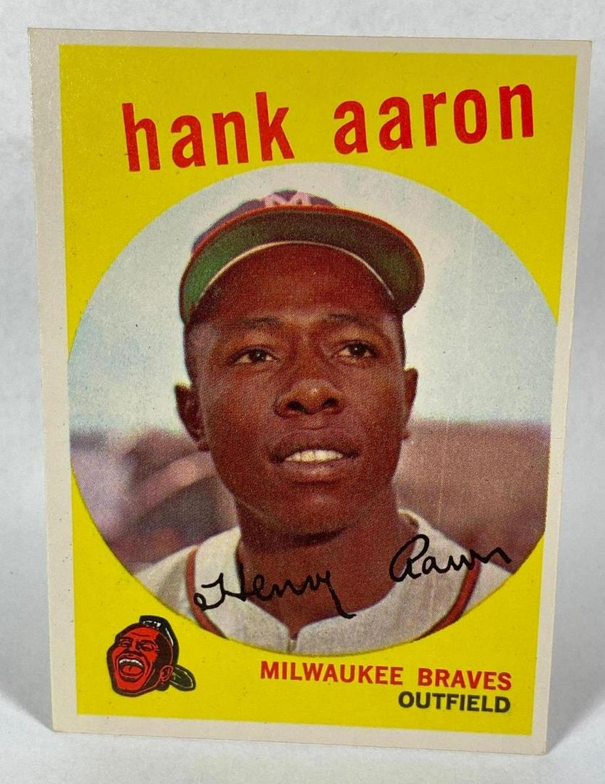 1959 Topps #380 Hank Aaron Milwaukee Braves: Centering keeps this card from being NRMT or better grade.Â What a looker!