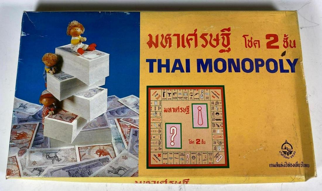 Rare 1995 Edition of Thai Monopoly NIB: Hard to come New in Box by Monopoly Thai edition by Leaping Dog 1995. Currency, cards and token still in original packaging. Box does have some slight warping, see photos.