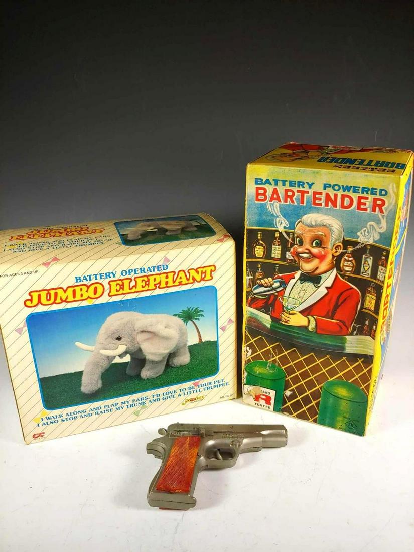 Vintage Toy Group: Group includes; 1950's Hubley Automatic toy pistol, Rosko battery powered Bartender and Jamina battery operated Jumbo Elephant. Bartender in very good condition, Hubley in age appropriate used conditi
