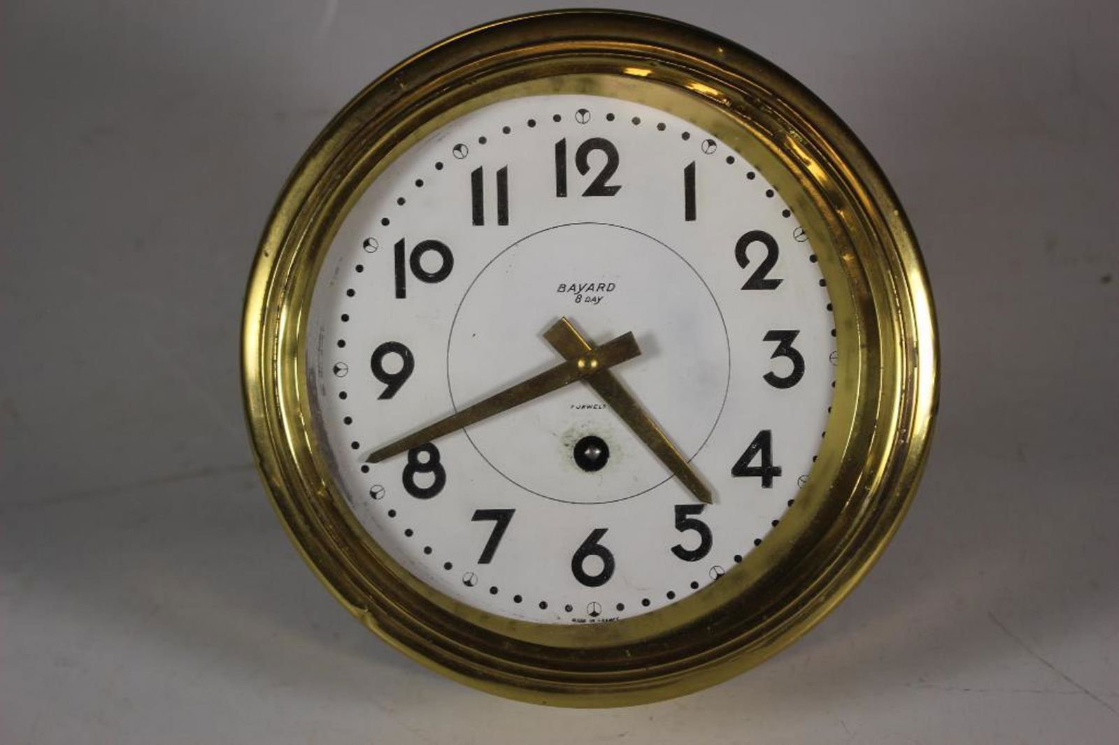 Bayard 8 Day Nautical Ships Clock: French Nautical Ships Clock by BAYARD. Eight day 7 jewels brass ships clock. Winds up and appears to currently be working condition. Measuring approx 7.5" in diameter. See photos.