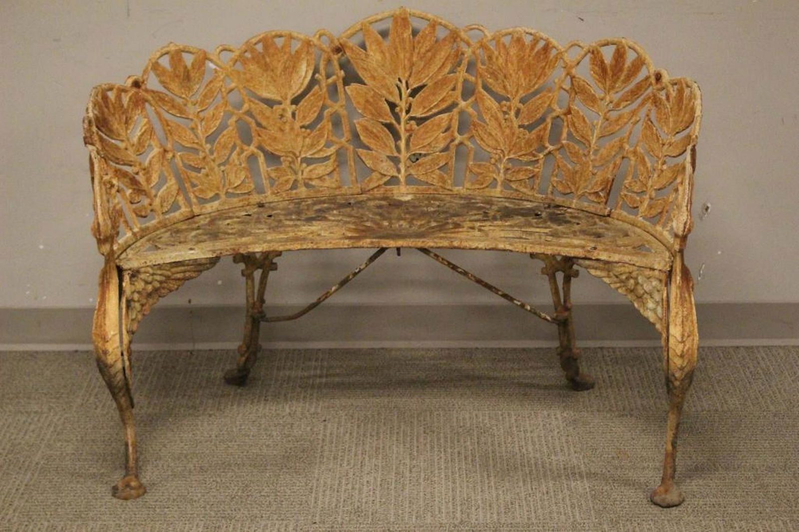 Early American "Laurel" Pattern Cast Iron Bench: American "Laurel" Pattern Cast Iron Bench signed on both side HART. Atlanta, mid-19th century with winged griffin, curved garden bench on cabriole legs and claw feet Measuring approx 44" wide x 29" ta