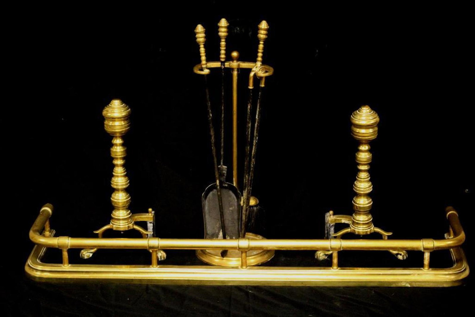 18th c. Brass Fireplace Set Andirons: Late 18th early 19th century fireplace set. Likely English which includes claw footed beehive style Andirons, brass fender or skirt and matching fireplace tool set.