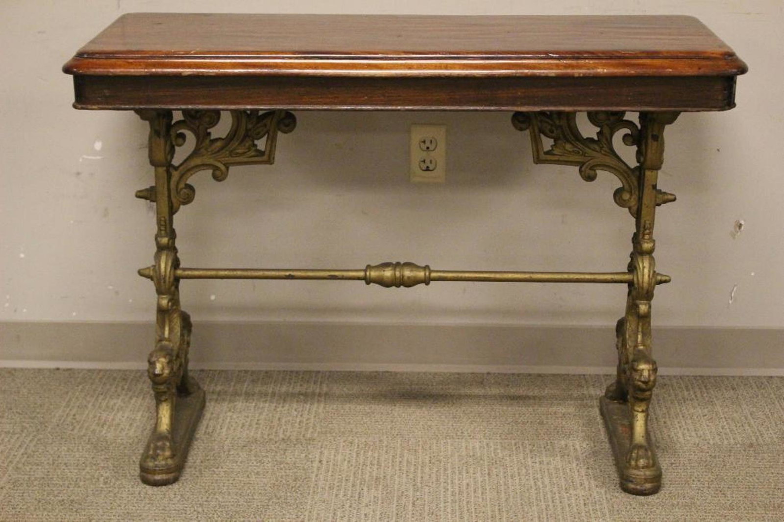 19th Century Winged Griffin Gilt Table: Fine 19th century continental winged griffin cast iron with gilt base and wood top. Appears Italian, origin not identified. See photos. Measuring approx 30" tall x 42" wide x 18" deep