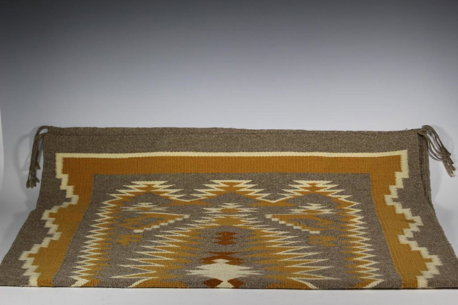 Early 20th Century Native American Throw Rug: 1920/30's Native American throw rug multi-colored with crisp sharp design. Approx 33 1/2" by 46". In very good condition, see photos.