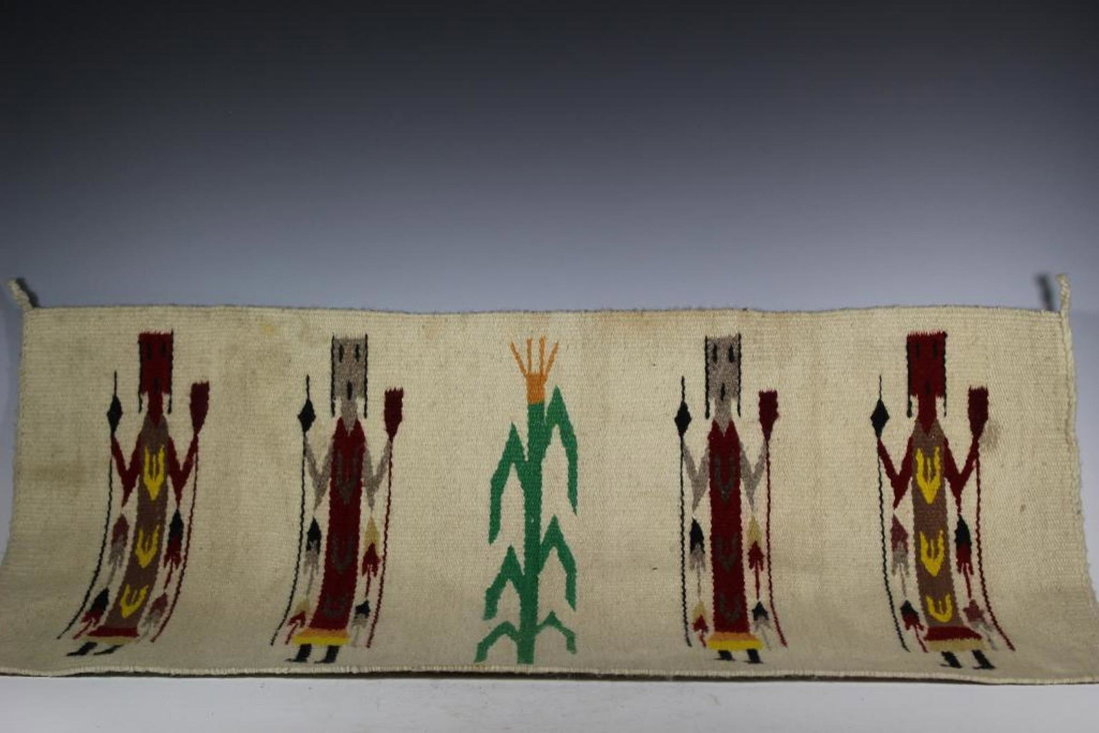 Early 20th Century Native American Throw Rug: 1920/30's Native American throw rug bright multi-colored with crisp sharp design. Approx 20" by 37" with 2" tassels. In very good condition, see photos.