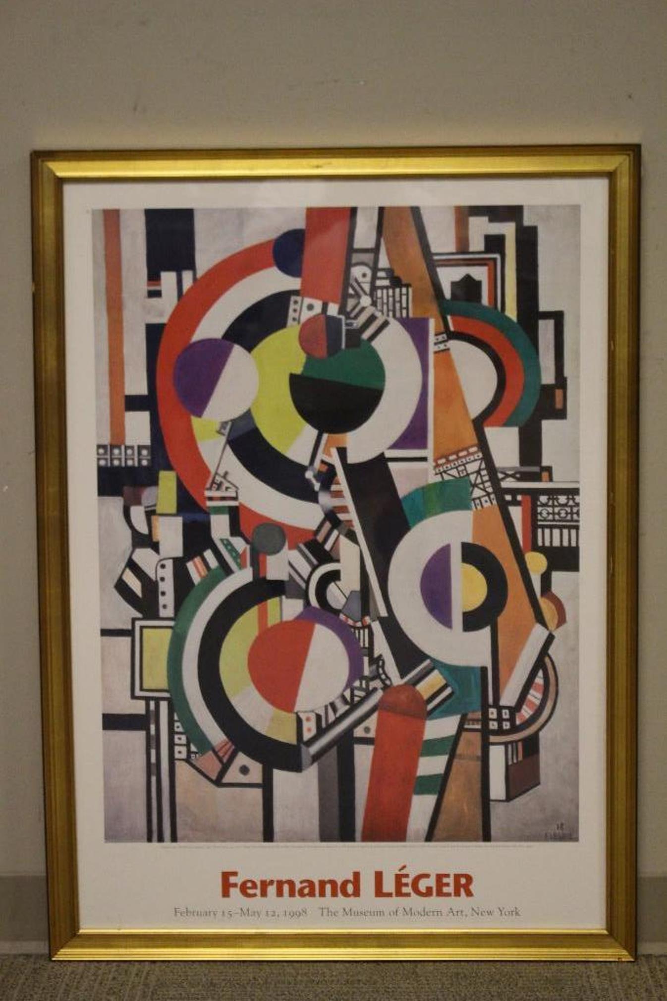 Fernand LEGER New York MMA Exposition Poster: New York The Museum of Modern Art 1998 Exposition poster. Professionally framed poster features litho of Fernand LEGER's original 1918 oil painting titled The Disks. Excellent condition with fun vibra