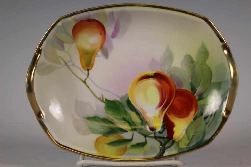 Hand Painted NIPPON Dish: Hand painted fruit porcelain dish with double handles and gold trim. Measuring approx 7" wide x 5.5" deep. Good condition as shown, see photos.