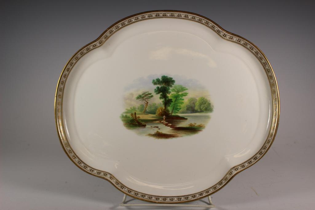 19th Century MINTON Porcelain Tray: Hand painted with center landscape river scene porcelain charger or tray by MINTON. Circa 1873-1880. Measuring approx 13" wide 11.25" tall. Condition is good. No found signature, see photo.