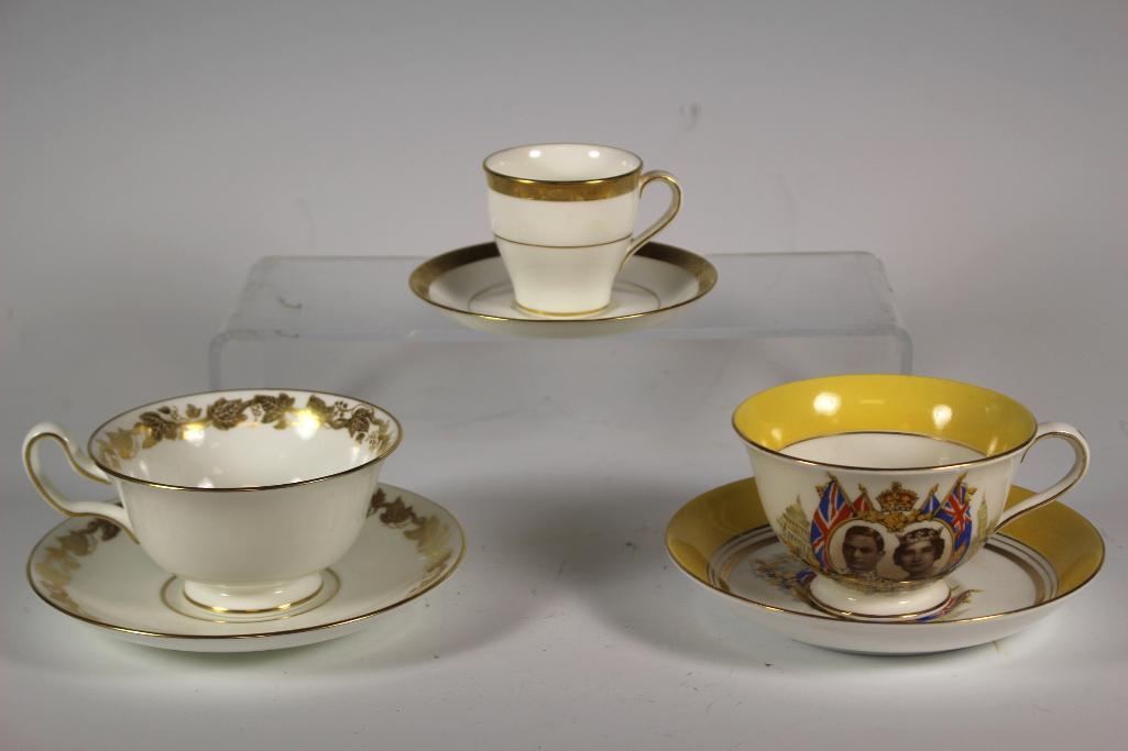 Collection of Three Cups and Saucers: Group includes; Wedgwood "Whitehall' pattern with hairline crack on side, Mintons white and gold Expresso and Colclough China King George IV and Queen Elizabeth. In good condition, see photos.