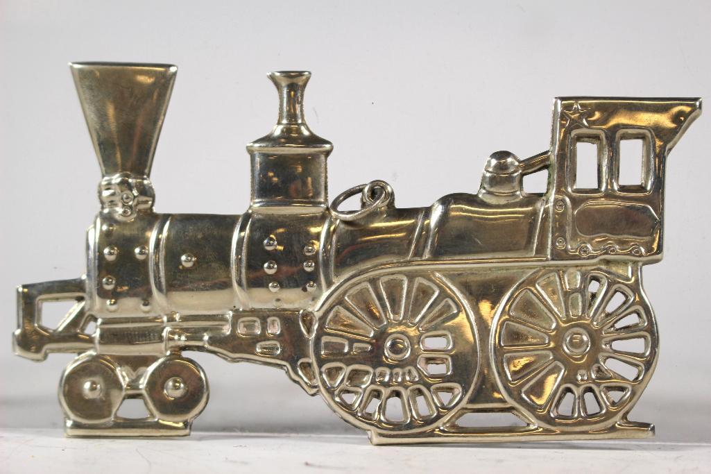 Gorham Sterling Silver Locomotive Ornament: American Heritage Society 1975 Christmas locomotive ornament by Gorham Sterling. Approx. 4 1/4" long 29.6 grams. In good condition, see photos.
