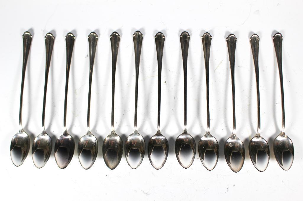 12 Antique Silver Plate Iced Tea Spoons: Set of 12 antique iced tea spoons 7" long. In good age appropriate condition, see photos.