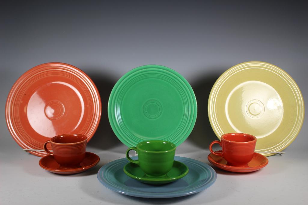 10 Piece Fiesta Collection: Group includes; 3 coffee cups, 3 saucers and 4 dinner plates in variety of colors. All in good condition with light to no signs of use, see photos.