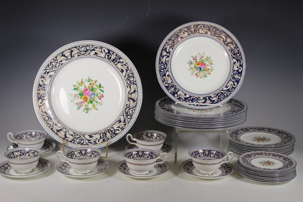 Wedgwood Navy Florentine: Thirty two piece Wedgwood Navy Florentine pattern service for six with many extras. Includes six cups, sixteen saucers 6", eight salad plates 8", eight diner plates 10.75" and one large platter 13.25"