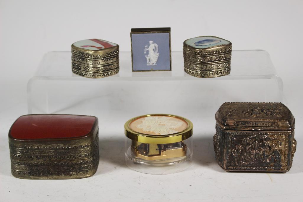 Group if Six Decorative Trinket Boxes: Included ornate JB raised relief hinged lidded box with blue fabric liner measuring approx 3" wide x 2" tall, hardstone lidded box approx 3.2" wide, two smaller silver plated boxes, Jasper Wedgwood st