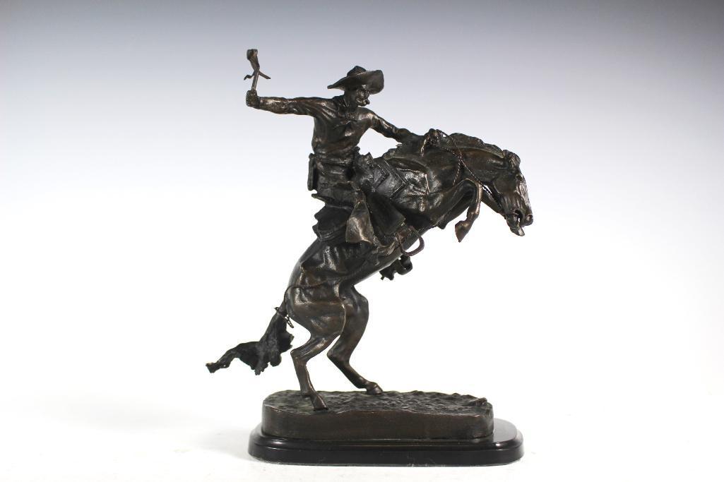 Vintage After Frederic Remington Bronze: 1982 bronze attributed to Fredrick Remington Bronco Buster casting by collectors west inc. Approx. 9" tall with base being a little loose but still attached.