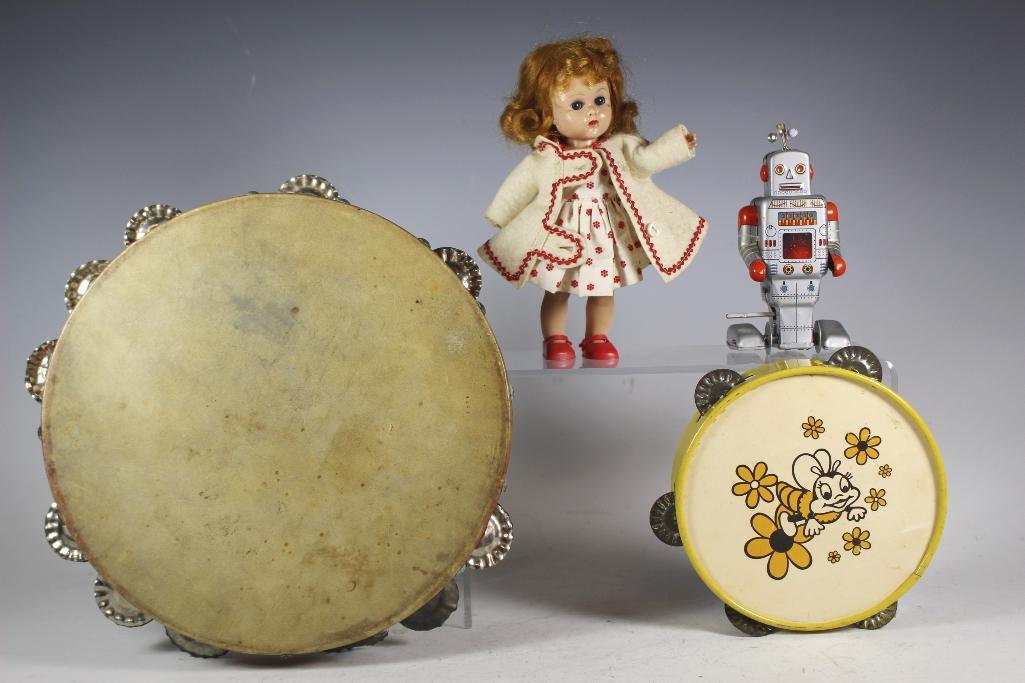 Vintage Toys Tin Doll Tambourines: includes; 7 1/2" Vogue doll, vintage bee tambourine 6", vintage tin toy MS 372 wind up tin robot and early 1900's 10" tambourine. All in good age appropriate condition, see photos.