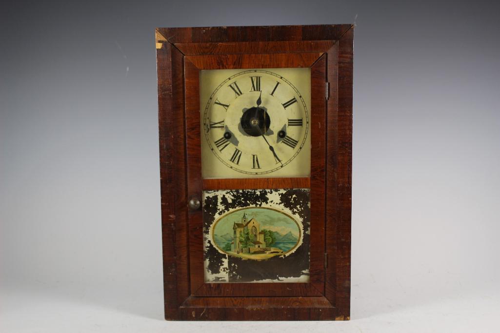 19th Century Seth Thomas Mantle Clock: Reverse painted glass with original paper direction inside. Approx. 15 3/4" tall. Clock face having some paint loss around key holes and hand holes and heavy paint losses to painted glass and some ven