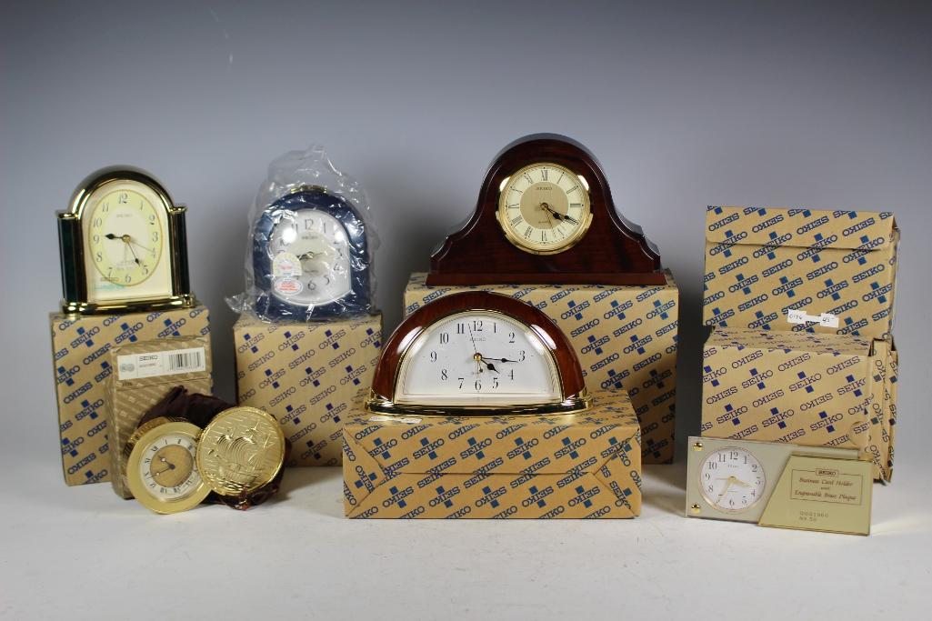 Collection of 8 Seiko Clocks: Collection Seiko Mantle clock, desk clocks, Quarts clocks and anniversary award clock. All new in box, see photos.