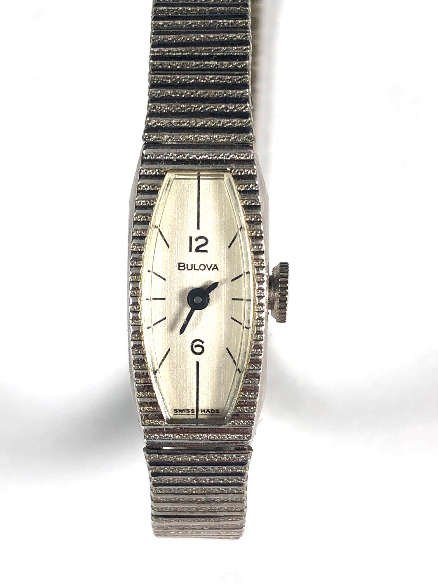 Vintage Rolled 10k Gold Bulova Wrist Watch: Serial number 477972 ladies rolled 10k white gold wrist watch. Good working condition, see photos.