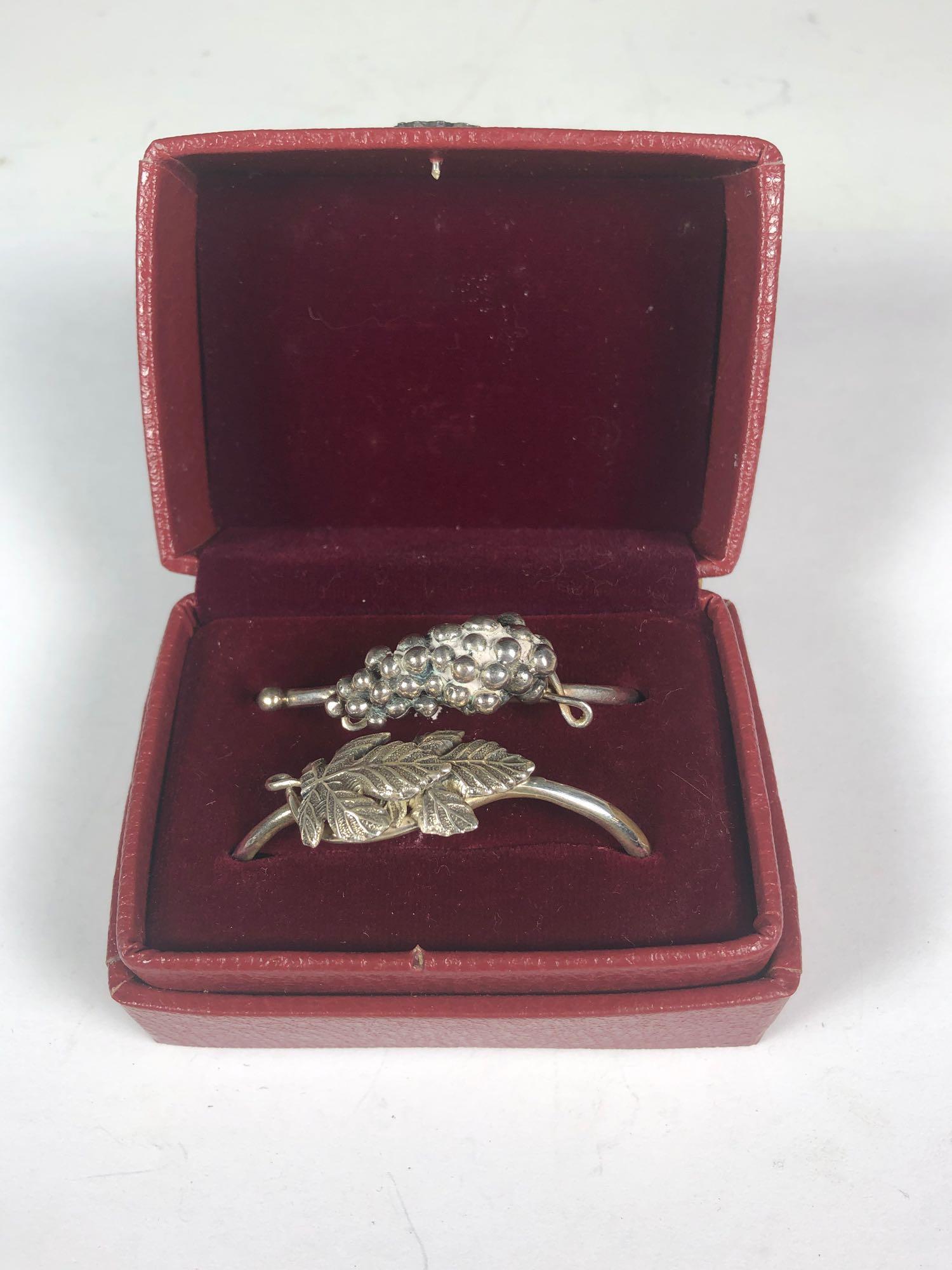 Two Sterling Silver Napkin Rings: Two sterling silver napkin rings marked .925 JC as shown. In Red leather box as shown, see photos. Weighs approx 36 grams for both.