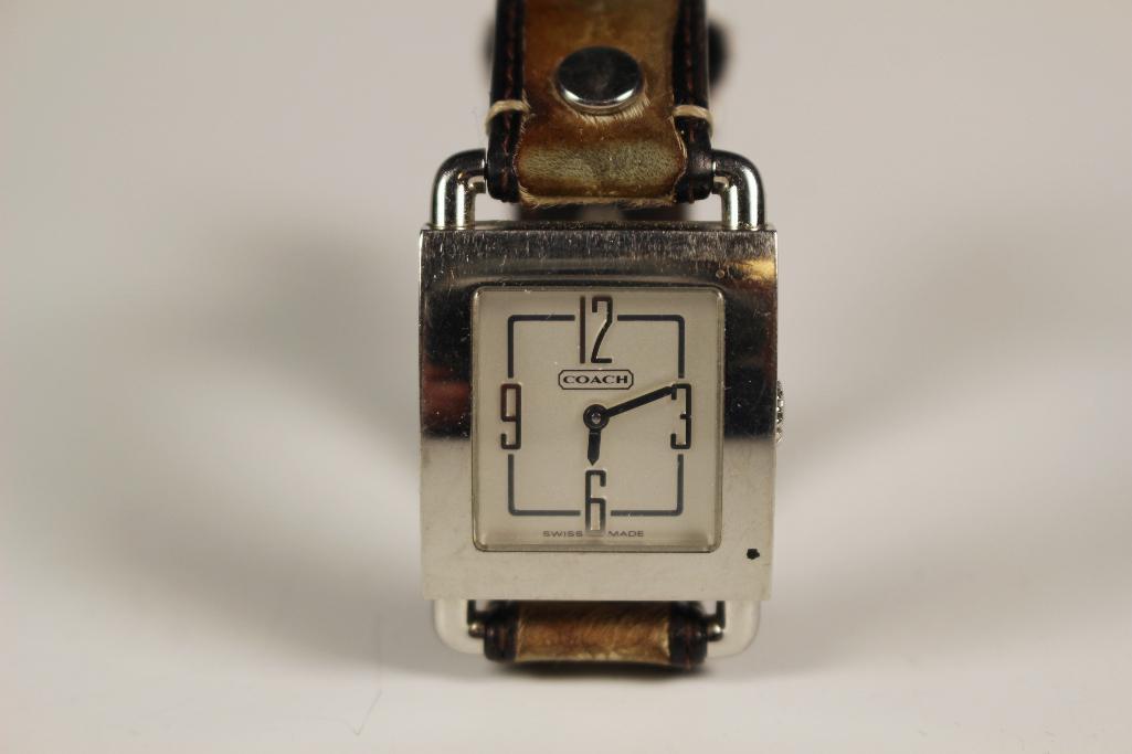 Vintage Ladies Square Faced COACH Wrist Watch: Coach wrist watch with leather band and stainless steal face. Signs of use as shown, see photos.
