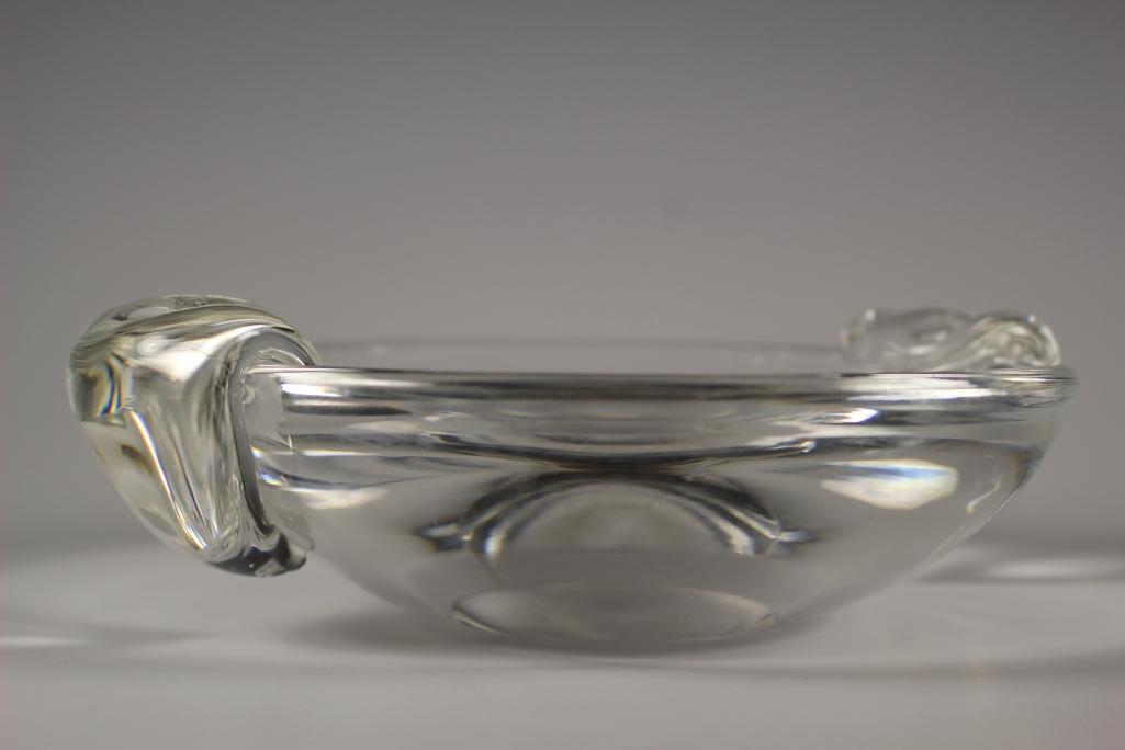 Mid Century Steuben Art Glass Candy Dish Bowl: Mid century Steuben clear glass handled candy dish with tear drop handles. Approx. 9" diameter. Signed on bottom in good condition with some scratches to bottom, see photos.