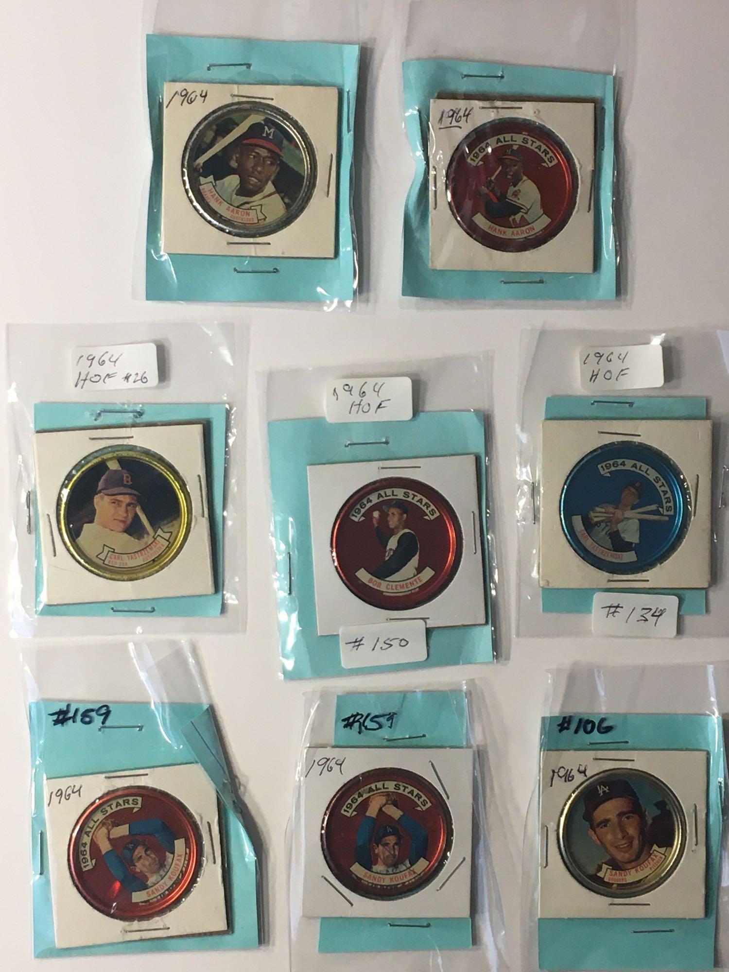1964 Topps Coins Clemente, Yaz & Koufax: A total of (8) coins. Regular issue of Clemente, Yaz, Koufax and Aaron. Also All-Star issues of Koufax(2, one scratched), Yaz and Aaron. Typical signs of wear and handling.