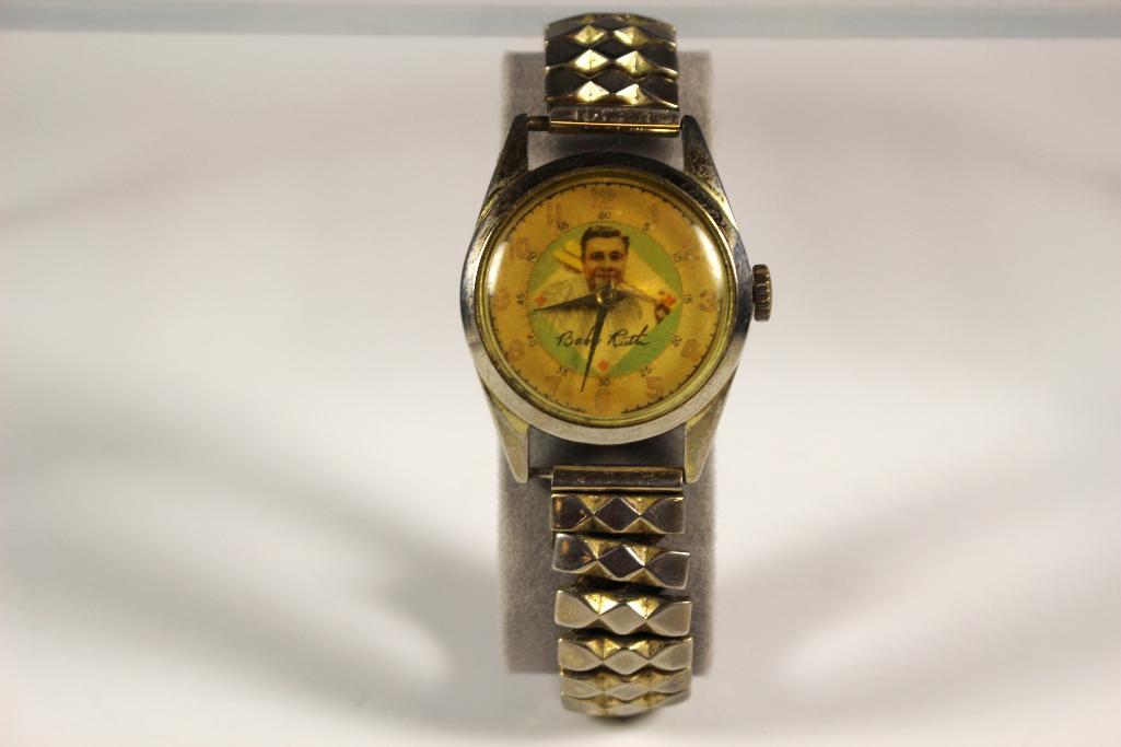 Vintage Babe Ruth Working Wrist Watch: Our best guess is that this is an Exacta watch from the 1940's that does not have the original back. The metal back is more modern or the face has aged differently. The face has signs of age and use a