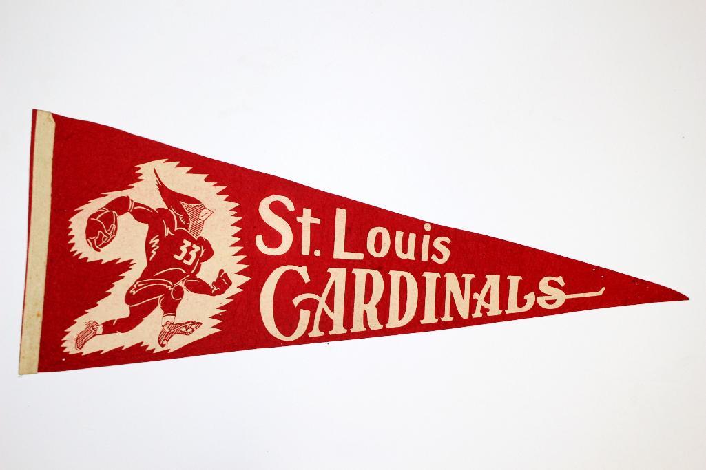 1960''s St. Louis Cardinals Football Pennant: Full sized pennant made of red felt and white design/text. Cardinal mascot in uniform carrying the ball and outlined in white. Exhibits some signs of handling and displaying. There are multiple pin ho