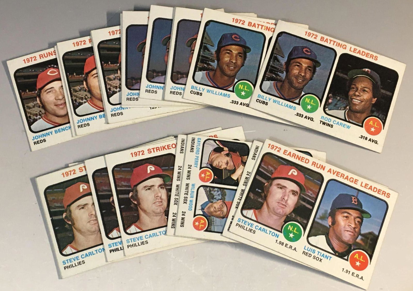1973 Topps Baseball Leaders Cards: (22) cards that range from EX-EXMT. #61 Batting Leaders(2), 62 Home Run Leaders(4), 63 RBI Leaders(6), 65 ERA(1), 66 Victory(3) 67 Strikeout (4)(Nolan Ryan/Steve Carlton, 68 Saves(2)