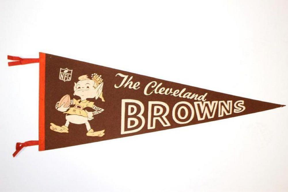 1965 Cleveland Browns Brownie Elf Champ Pennant: This full sized pennant was made after the Browns won the 1964 NFL championship. It was sold during the follwing season and as you can imagine, is very popular! Very nice condition with minor pin hole