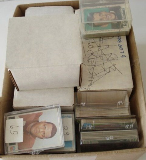 1960's Football Card Collection: A couple hundred cards in assorted boxes. Noticed 1966 Phila Jim Brown, (2) Jerry Rice rookies. Most all cards range from 1960-1969. Extremely useful lot with loads of breakdown potential.