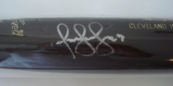 Omar Vizquel Signed Team Issued Bat: What a beautiful two tone M216 model, Louisville Slugger! This beautiful bat is signed in silver by the star shortstop!