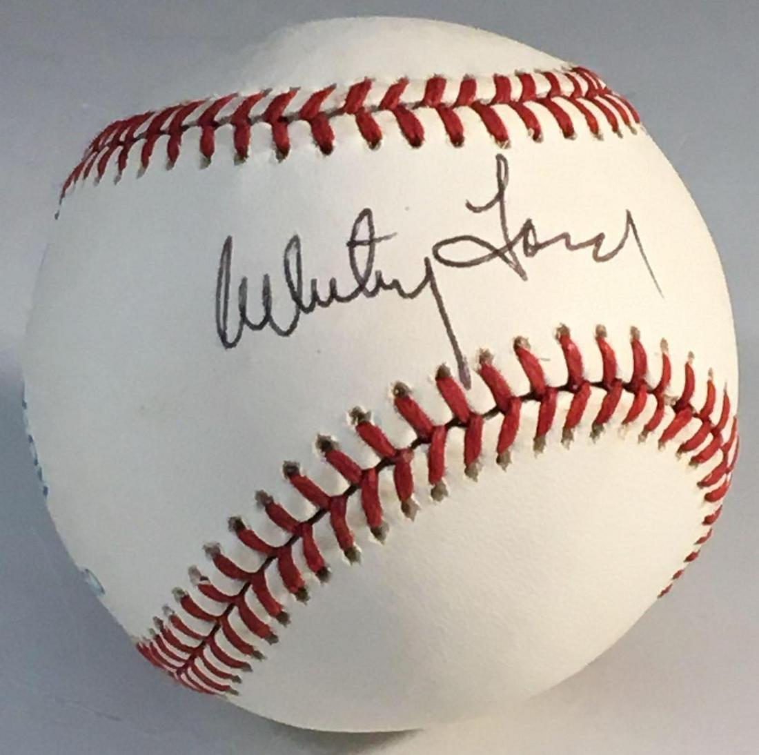 Whitey Ford Autographed Baseball New York Yankees: Official Bobby Brown baseball signed on the sweet spot in black pen by the HOF pitcher. Very strong signature! Comes with sticker and cert from James Spence Authentication.