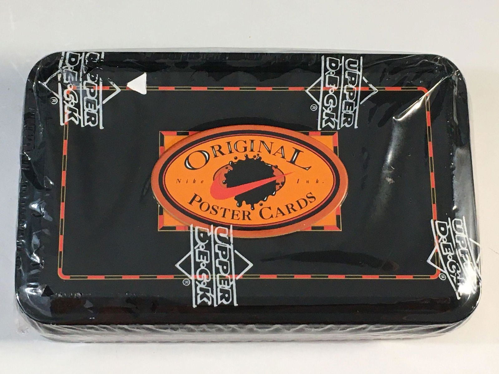 1994 Upper Deck/Nike Poster Cards Unopened Tin: Factory sealed tan of the ten poster cards. Michael Jordan is one of the nine players and many attributed this issue to the original Nike poster of Michael Jordan in 1984. Also Gaylord Perry, Howie Lo