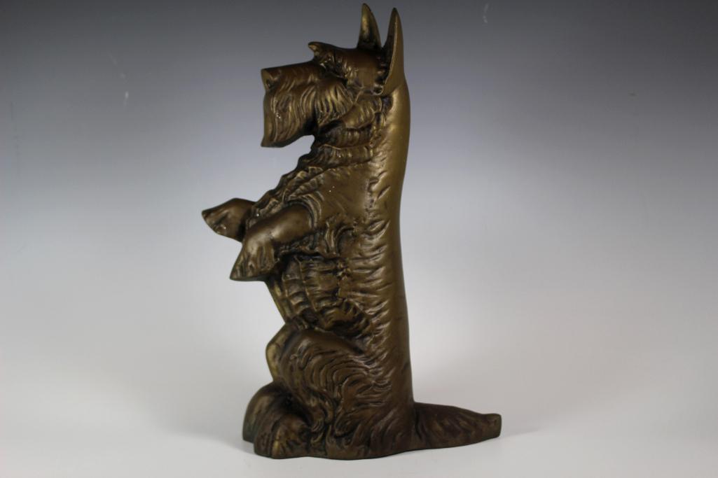 Bronzed Cast Iron Standing Scottie Door Stop: Finely detailed antique cast iron standing Scottie door stop with bronze finish. Measures 16 1/4" high.